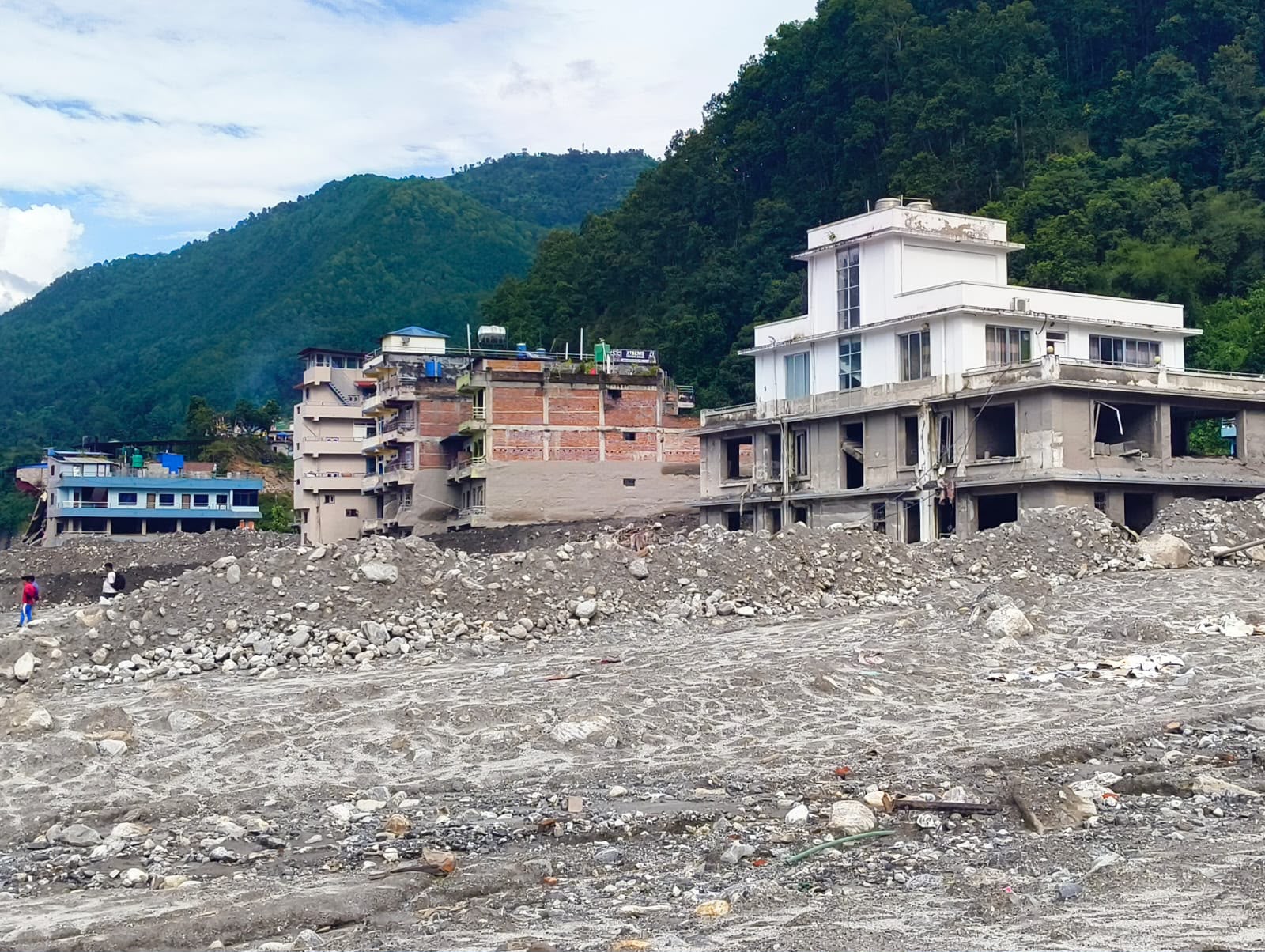 Flood damage Buildings gutted by the floodwaters below the hills