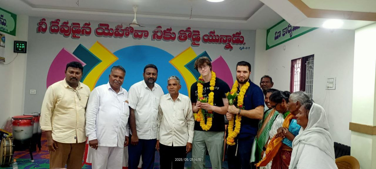 Welcome with garlands Visiting brothers welcomed with flower garlands by the church leaders